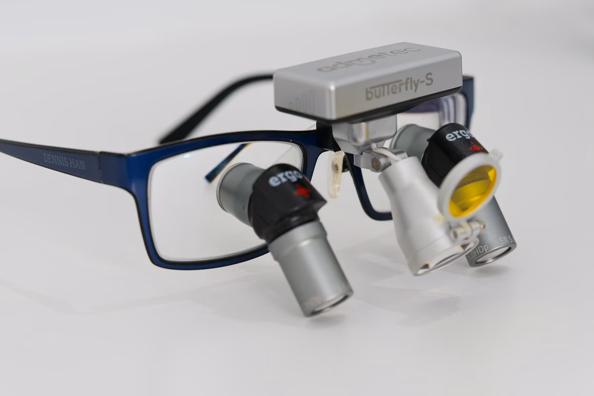 Admetec Ergo dental loupes with wireless Butterfly lighting used at Balmoral Dental Centre